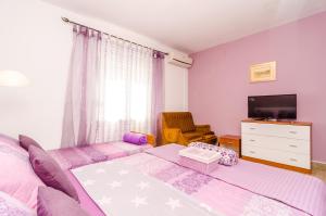 Postel nebo postele na pokoji v ubytování Apartment Bay of Dreams