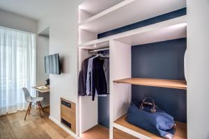 Telewizja i/lub zestaw kina domowego w obiekcie Victor Boutique Hotel