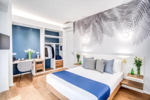 Łóżko lub łóżka w pokoju w obiekcie Victor Boutique Hotel