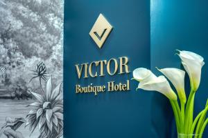 Certyfikat, podpis lub inny dokument wystawiony w obiekcie Victor Boutique Hotel