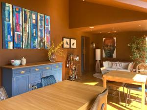 a living room with a table and a couch at Tigh Na Leigh in Alyth