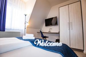 Postel nebo postele na pokoji v ubytování Hotel "Zur Mühle"