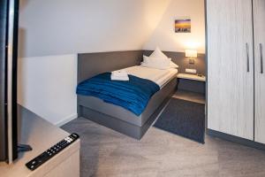 Postel nebo postele na pokoji v ubytování Hotel "Zur Mühle"