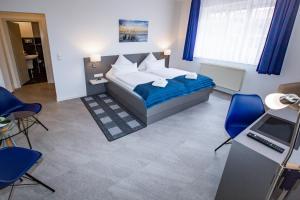 Postel nebo postele na pokoji v ubytování Hotel "Zur Mühle"