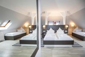 Postel nebo postele na pokoji v ubytování Hotel "Zur Mühle"