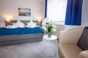 Postel nebo postele na pokoji v ubytování Hotel "Zur Mühle"