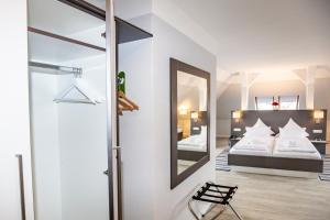 Postel nebo postele na pokoji v ubytování Hotel "Zur Mühle"