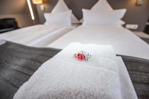 Postel nebo postele na pokoji v ubytování Hotel "Zur Mühle"