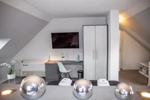 TV a/nebo společenská místnost v ubytování Hotel "Zur Mühle"