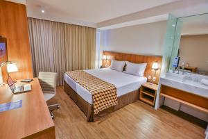 Postel nebo postele na pokoji v ubytování Sleep Inn Aeroporto de Guarulhos - São Paulo