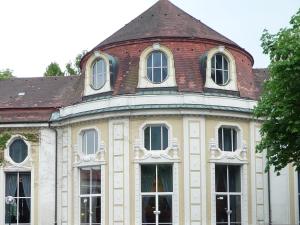 an old building with a tower on top of it at Haus Alpenruhe in Bad Reichenhall