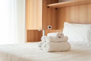 Postel nebo postele na pokoji v ubytování Adria Beach Hotel