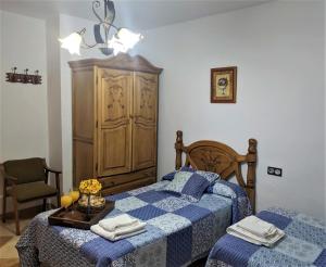 Ліжко або ліжка в номері Hostal Moraima