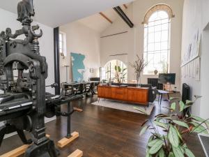 a large room with a camera and a table at The Pump House Art Studio in Gainsborough