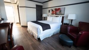 Postel nebo postele na pokoji v ubytování Hôtel Le Francis