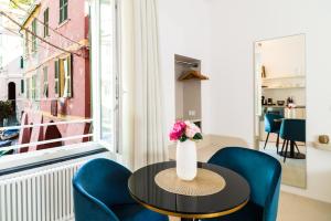 Kuchyň nebo kuchyňský kout v ubytování MADA Charm Apartments Piazza