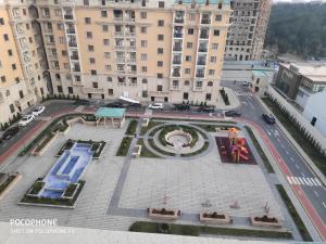 an aerial view of a courtyard in a building at Guest house boulevard 1 in Sumqayıt