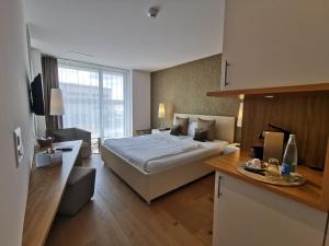 Ліжко або ліжка в номері Hotel AVA