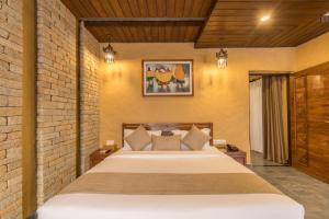 Ένα ή περισσότερα κρεβάτια σε δωμάτιο στο Bar Peepal Resort
