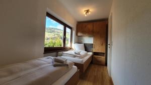 Posteľ alebo postele v izbe v ubytovaní Absolute Active Mountain Resort