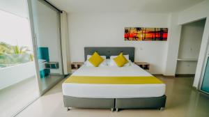 Cama o camas de una habitación en Hotel Green Coveñas