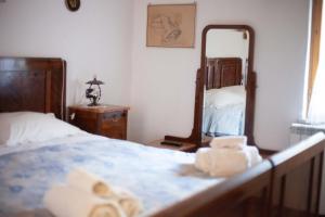 Postel nebo postele na pokoji v ubytování B&B La Baita