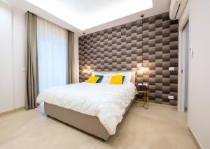 Łóżko lub łóżka w pokoju w obiekcie Napoli City Center - Appartamenti e Camere