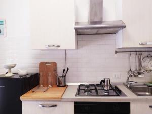 A kitchen or kitchenette at Villa Vittorio - Splendid panoramic sea view terrace