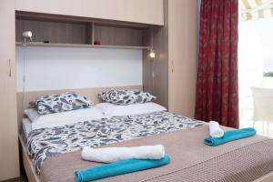 Giường trong phòng chung tại Apartment Bilalovic