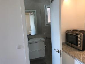 A kitchen or kitchenette at Studio Views Apartment, Cortijo Fruitful Hills