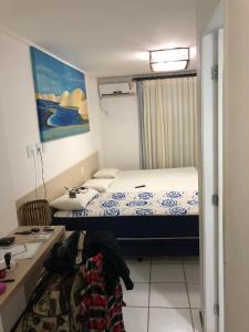 Łóżko lub łóżka w pokoju w obiekcie Aptos Gran Lencois Flat Res.