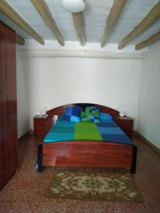 Posteľ alebo postele v izbe v ubytovaní Casa la Canal