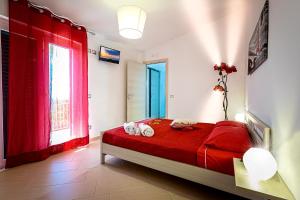 Postel nebo postele na pokoji v ubytování B&B IL TEMPONE