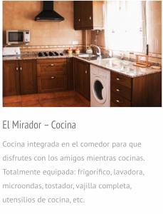 een keuken met een wastafel en een wasmachine bij El mirador 1 in Alcalá del Júcar