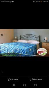 Postel nebo postele na pokoji v ubytování B&B Il Casolare