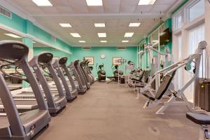 a gym with rows of treadmills and machines at The Beach Club Resort and Spa in Gulf Shores