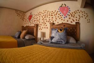 Voodi või voodid majutusasutuse HOTEL CASA LIMON toas
