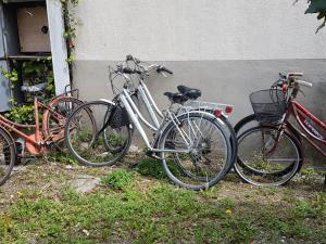 a group of bikes parked next to a wall at Sole...Mare...e...Spiaggie Bianche! in Vada