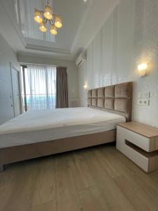 Кровать или кровати в номере Apartment Ideal House