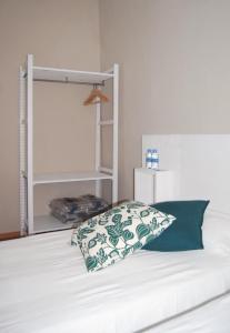 Postel nebo postele na pokoji v ubytování Hostal l'Estrella