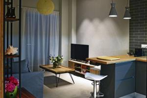 Et tv og/eller underholdning på Amazing beach house