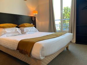 Ένα ή περισσότερα κρεβάτια σε δωμάτιο στο Hotel Alexandra - Boutique Hotel