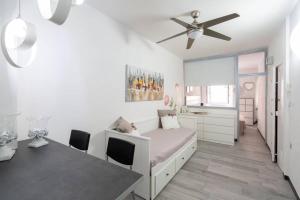 A bed or beds in a room at LE NOTTI GEMELLE