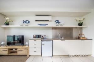 Kjøkken eller kjøkkenkrok på Absolute Waterfront Magnetic Island
