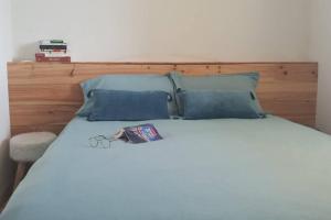 Postel nebo postele na pokoji v ubytování Les belles papottes