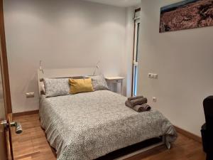 Postel nebo postele na pokoji v ubytování Wanderlust María Pita