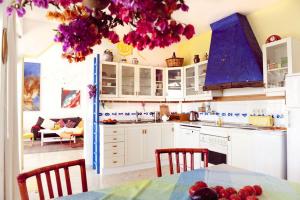 A kitchen or kitchenette at Holidays in Tarajalejo - home office with sea view