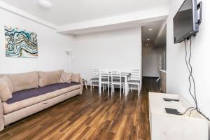 Μια τηλεόραση ή/και κέντρο ψυχαγωγίας στο Timea Apartment