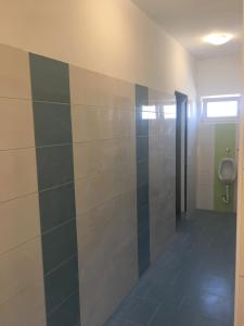 Kúpeľňa v ubytovaní Backpackers Home