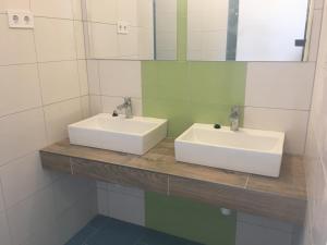 Kúpeľňa v ubytovaní Backpackers Home